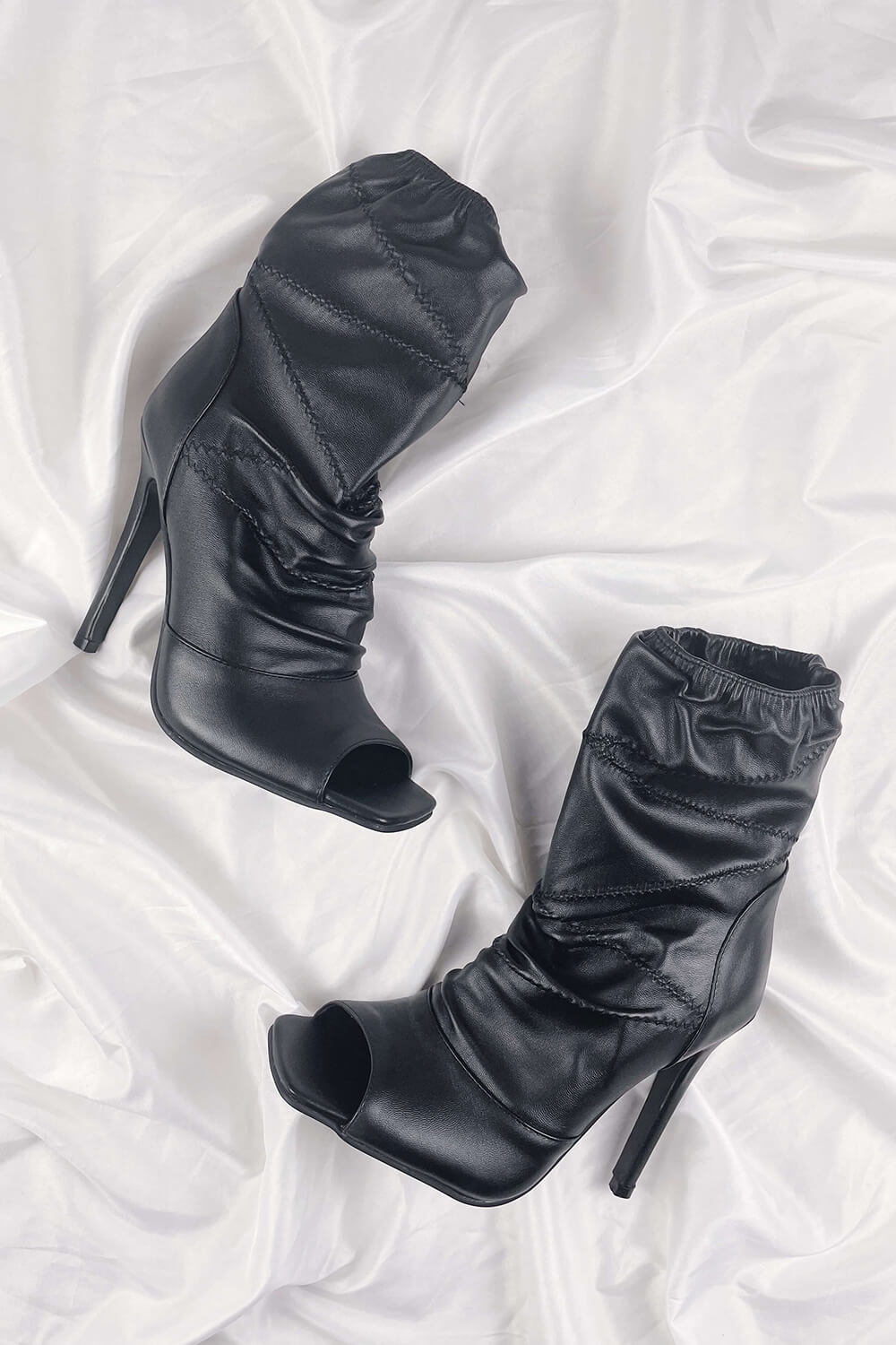 Achika belted peep toe on sale bootie